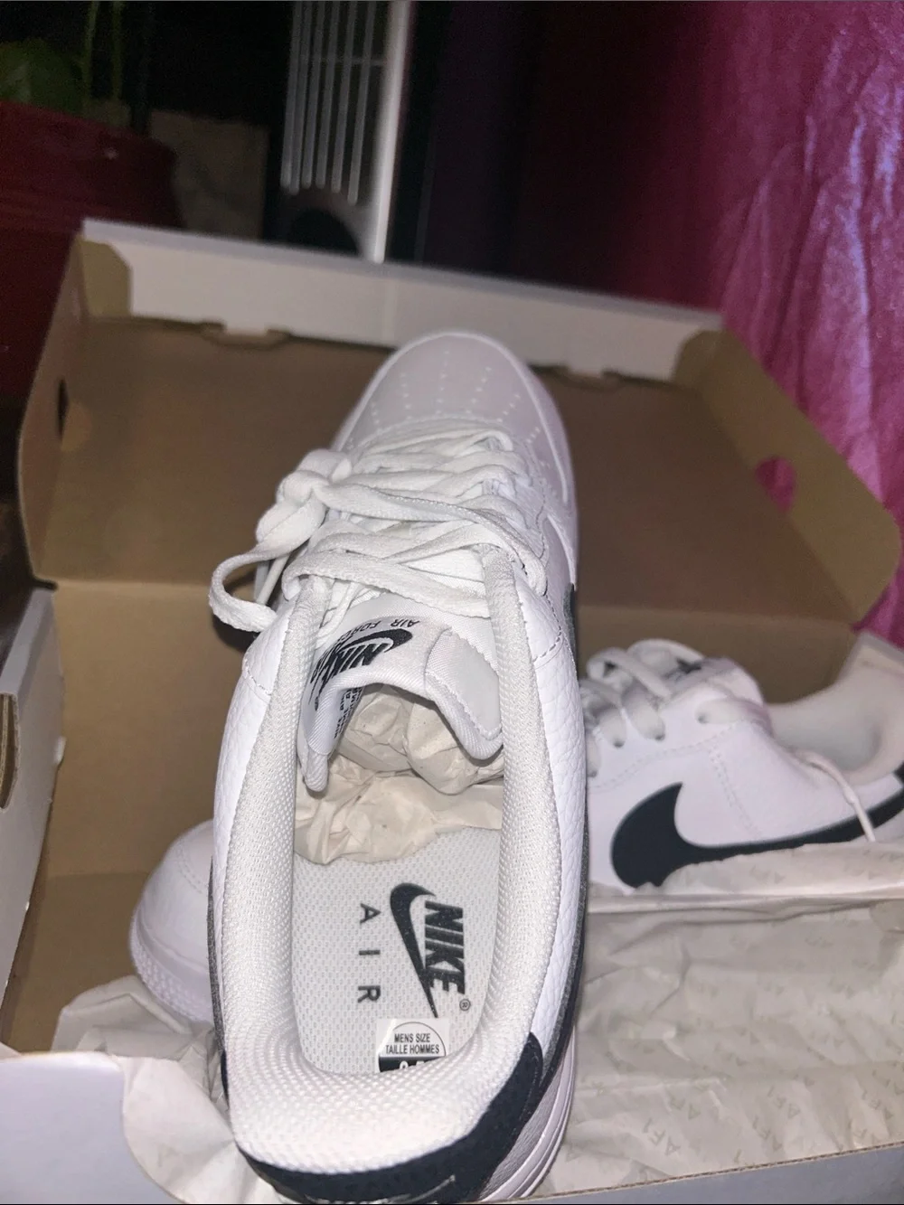 Nike White Leather Low-Top Sneakers with Black Swoosh